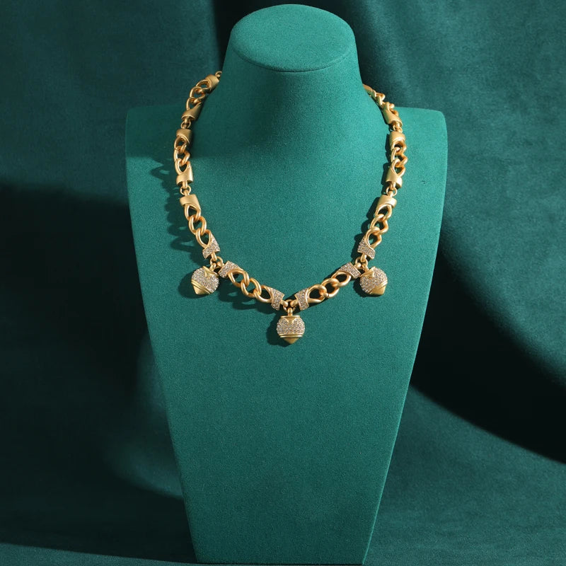 80s Power Glam Gold Heart Charm Necklace – Rhinestone Statement Chain