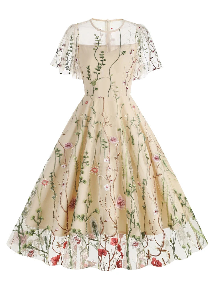 Enchanting Elegance: The "Floral Reverie" Embroidered Mesh Dress!