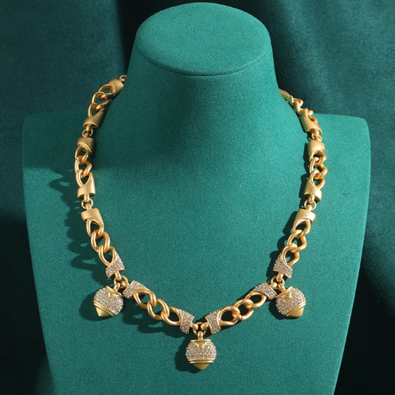 80s Power Glam Gold Heart Charm Necklace – Rhinestone Statement Chain