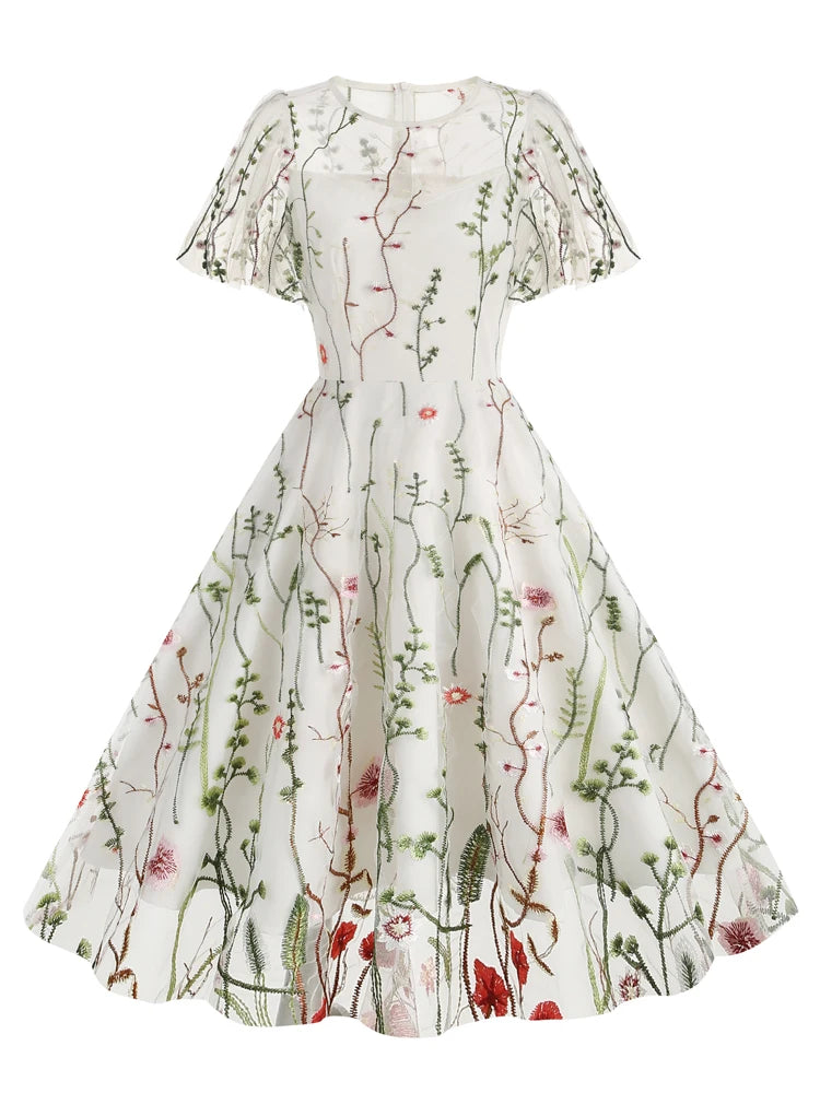 Enchanting Elegance: The "Floral Reverie" Embroidered Mesh Dress!