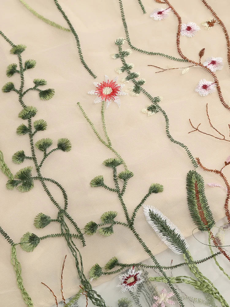 Enchanting Elegance: The "Floral Reverie" Embroidered Mesh Dress!