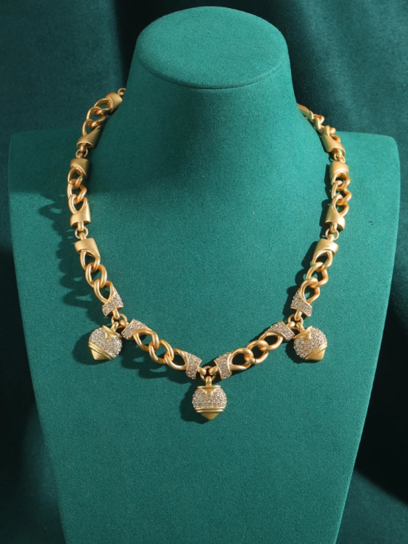 80s Power Glam Gold Heart Charm Necklace – Rhinestone Statement Chain