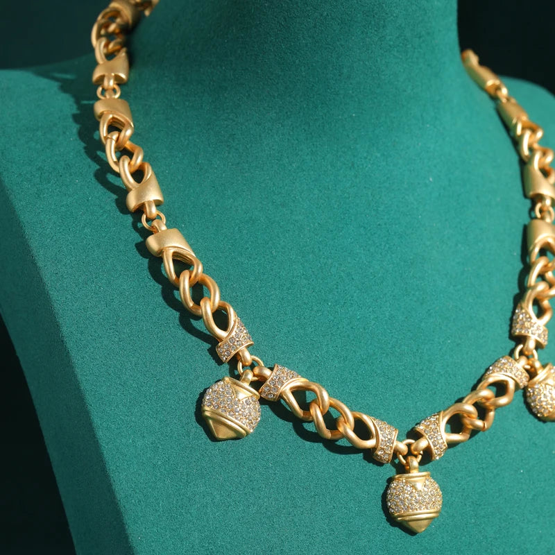 80s Power Glam Gold Heart Charm Necklace – Rhinestone Statement Chain