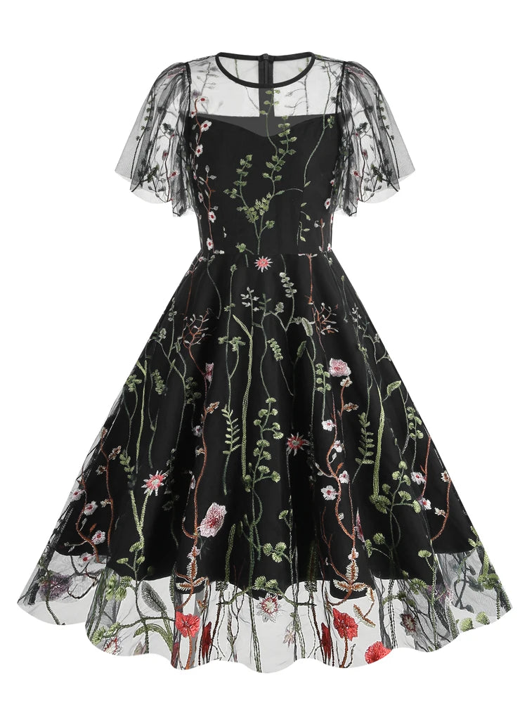 Enchanting Elegance: The "Floral Reverie" Embroidered Mesh Dress!